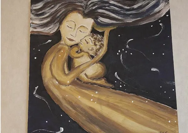 A painting of a mother holding her baby, in the consultation room